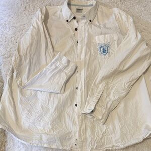 Disney Men's White Button-Down Shirt with Light Blue Crest
